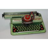 A tray lot including Mettoy typewriter, spinning top etc Condition Report: Available upon request