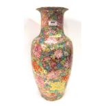 A Millefiori flower decorate vase, painted in colours on a gilt ground, 46.5cm high Condition
