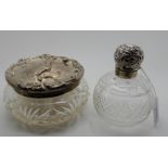 A lot comprising a sterling silver topped talcum jar and a silver topped scent bottle, Birmingham