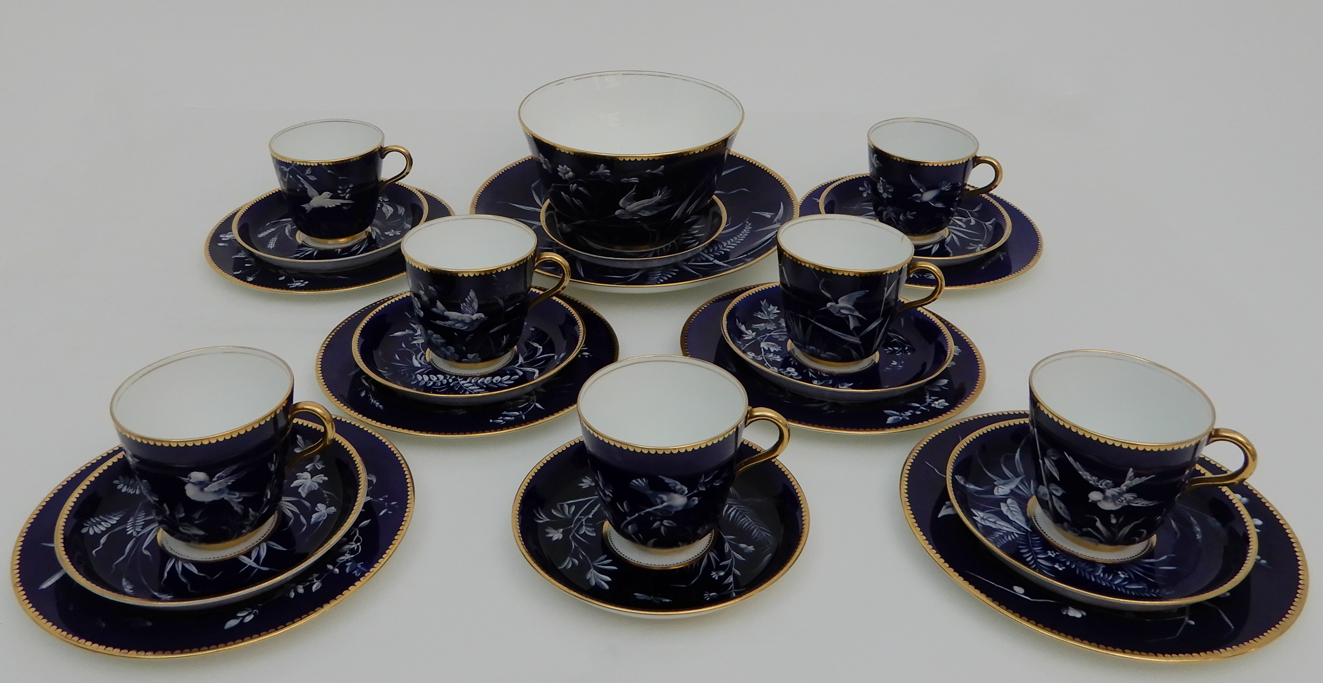 A LATE 19TH CENTURY T.C. BROWN-WESTHEAD MOORE AND CO PATE SUR PATE TEASET comprising eight cups,