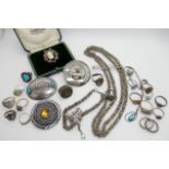 A collection of silver and costume jewellery to include, rings an Art Nouveau lady scarf ring etc