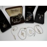 A collection of silver Ortak items to include pendants brooches and earrings some in sets and