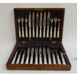 A cased twenty-four piece EP and mother of pearl dessert cutlery set Condition Report: Available