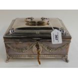 A silver plated casket decorated with floral swag decoration and fitted interior, 22cm x 16cm x 12cm