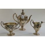 A three-piece silver plated tea service Condition Report: Available upon request