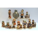 A Royal Worcester globular shaped pot pourri pot and cover and ten Hummel figures Condition