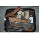 A tray lot of leather military belts and various gavels Condition Report: Available upon request