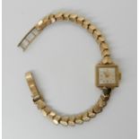 A 9ct gold ladies Longines watch with heart link strap, weight including mechanism 17.2gms Condition