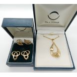 A 9ct gold Ola Gorie leaf pendant and two pairs of 9ct gold Ola Gorie earrings Condition Report: