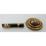 A 9ct gold mounted New Zealand jade brooch and a Victorian locket back brooch combined weight