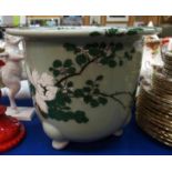 A Celadon glazed jardiniere with painted decoration Condition Report: Available upon request