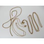 A 9ct gold long rope chain length 78cm, a 9ct vintage trace chain length 44cm and a fancy snake