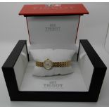 A ladies Gold plated Tissot wristwatch with diamond bezel Condition Report: Available upon request