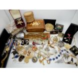 A collection of vintage costume jewellery and a compact to include decorative trinket boxes