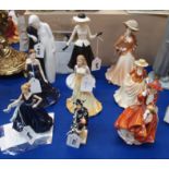 Eight Royal Doulton figures including Top O The Hill, October Opal, Congratulations, Jester