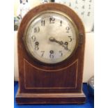 A domed topped bracket clock, the movement marked 958809 Condition Report: Available upon request