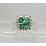 An 18ct gold four square emerald and diamond cluster ring, size O1/2, weight 3.3gms Condition