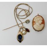 An 18ct gold shell cameo brooch, weight 5.1gms, 9ct herringbone chain, length 40.5cm, 9ct blue gem