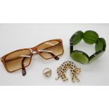 A 9ct gold cameo ring weight 2.7gms, a leopard brooch, vintage Christian Dior sunglasses and a