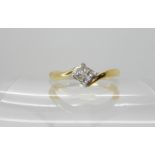 An 18ct gold four princess cut diamond ring set with estimated approx 0.15cts of diamonds, finger