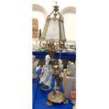 A gilded figural table lamp modelled as a woman with glass panel shade Condition Report: Available