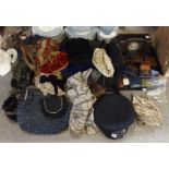 A collection of lady's evening bags and purses including tapestry, beaded, assorted hats and