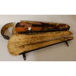 A two piece back violin 35cm with label to the interior " Copy of Antonius Stradivarius made in