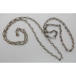 Two decorative silver chains Condition Report: Not available for this lot