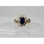 A retro blue and clear gem set retro cluster ring, size J1/2, weight 2gms Condition Report: