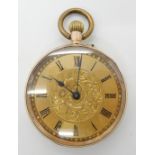 A 9ct gold fob watch, diameter 3.4cm, weight including metal dust cover and mechanism 33.1gms