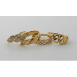 A 9ct clear gem set ring size S1/2, a 9ct Celtic knotwork ring size T, a 9ct rose and yellow gold