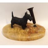 A spelter Scottie dog pen holder on onyx base Condition Report: Available upon request