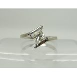 An 18ct white gold princess cut diamond ring of estimated approx 0.50cts, retailed by Chisholm