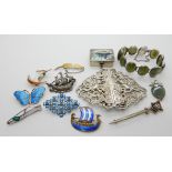 Four silver Norwegian enamel brooches three by Holth, to include two Longship brooches and a