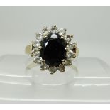 A 9ct gold sapphire and clear gem cluster ring size U, weight 5.7gms Condition Report: Available