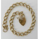 A 9ct gold curb link bracelet with heart shaped clasp length 20cm, weight 12.2gms Condition