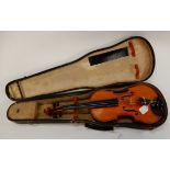 A two piece back violin with case Condition Report: Available upon request