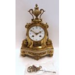 A 19th Century French gilt bronze mantle clock, the white dial with Arabic numerals, the movement