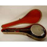 A vintage John Grey & Sons five string resonator banjo in faux mother of pearl, professionally set