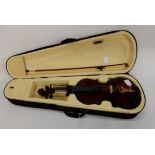 A modern violin with bow and case Condition Report: Available upon request