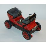 A Japanese tinplate model car (def) and a collection of modern model trucks Condition Report: