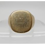 A 9ct gold gents signet ring stamped with an Egyptian hieroglyph inscription, size S1/2, weight 8.