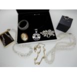 A silver Georg Jensen ring (in original box) a Tiangus Jackson silver pendant and a collection of