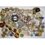 A Max Neiger Egyptian revival glass necklace, Deco clips, vintage beads etc Condition Report: Not