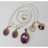 A 9ct amethyst pendant and earrings, two 9ct gold heart shaped pendants and a chain, combined weight