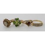 A 9ct gold peridot, diopside and diamond accent cluster ring, size Q1/2, a 9ct smoky quartz ring