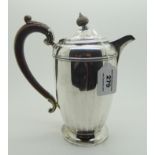 A silver hot water pot by Barker Brothers Silver Limited, Birmingham 1933, of cylindrical form