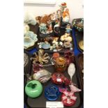 Assorted art glass paperweights and glasses together with a collection of animal ornaments including