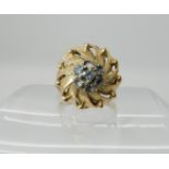 A bright yellow metal dome ring set with blue gems, size M1/2, weight 4.5gms Condition Report: