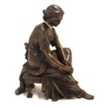 A bronze figure of a woman, indistinctly signed Condition Report: Available upon request